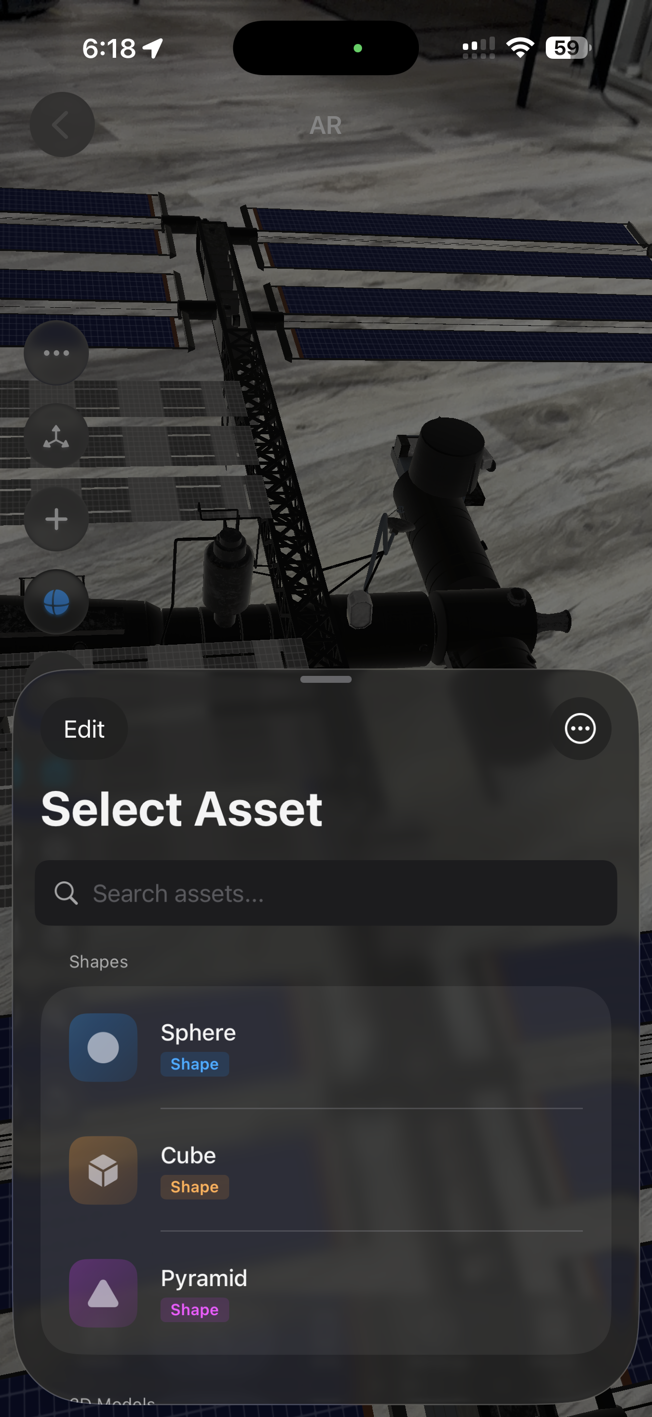Asset selection sheet showing geometric shapes and a search bar